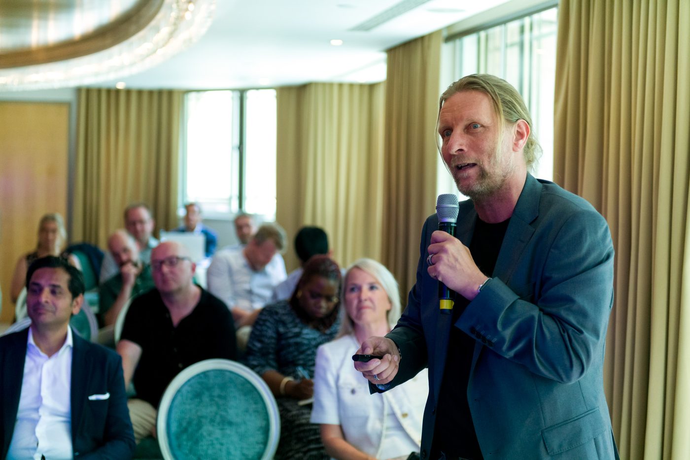 Peter de Jong presenting In AI We Trust in London, June 2026